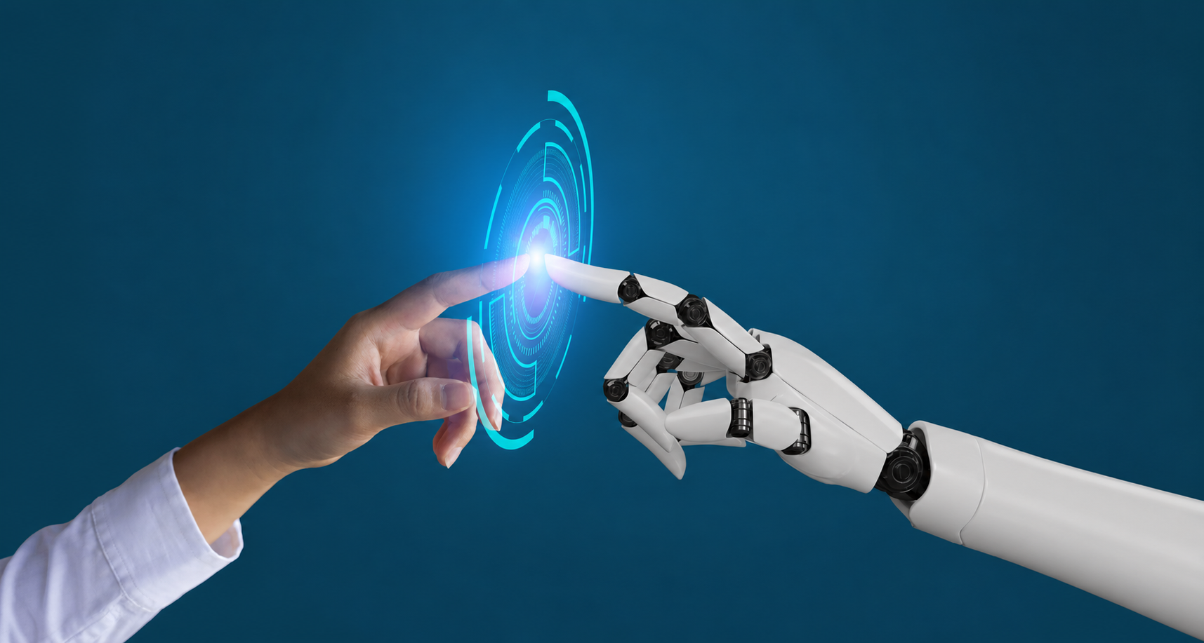 A human hand and a robot hand reaching toward each other over a glowing interface